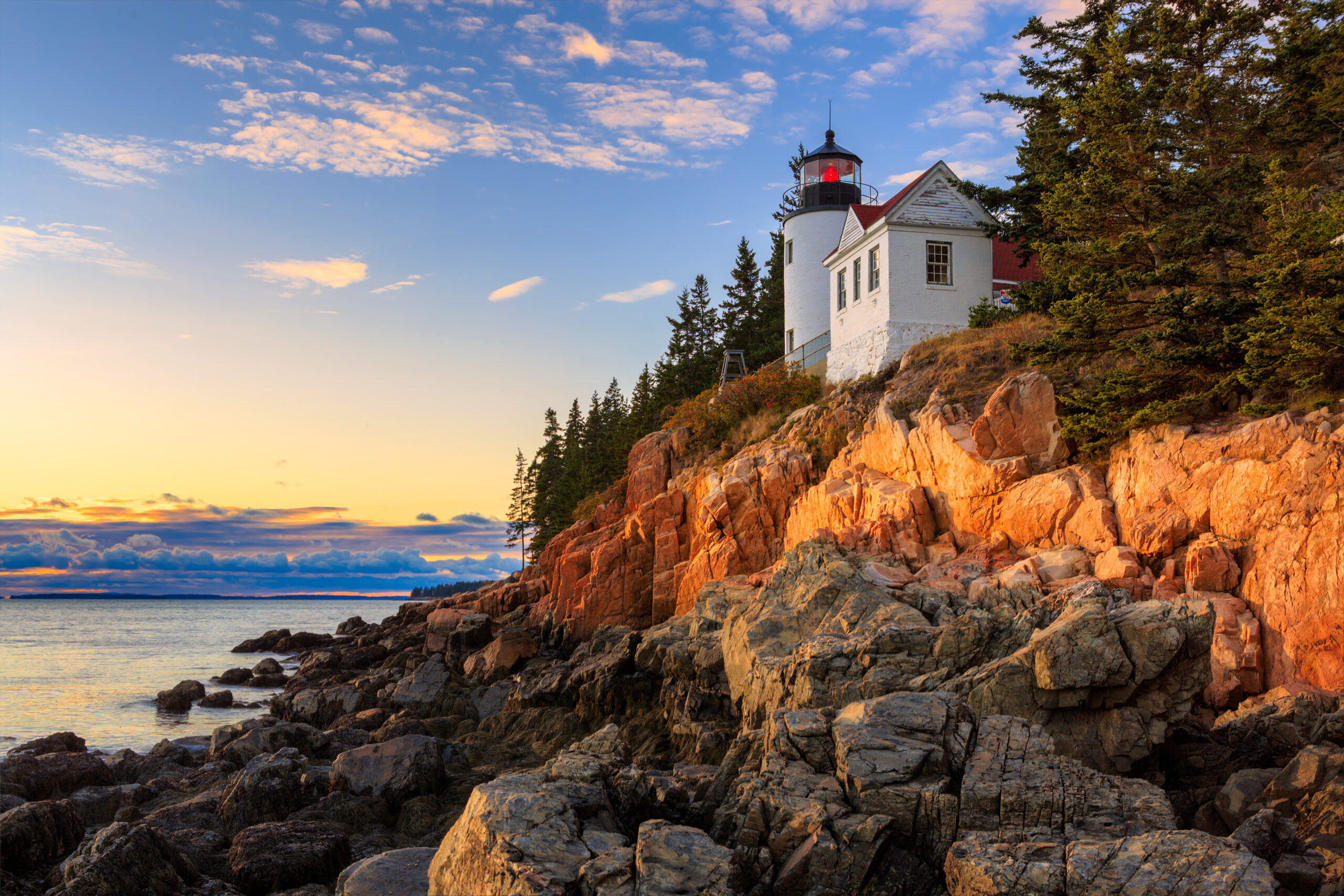 Sunset over Bass Harbor lighthouse in Acadia National Park.